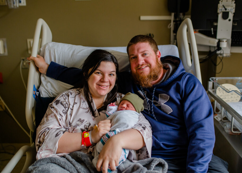 Smiling new family in fresh 48 session in the hospital in Little Rock